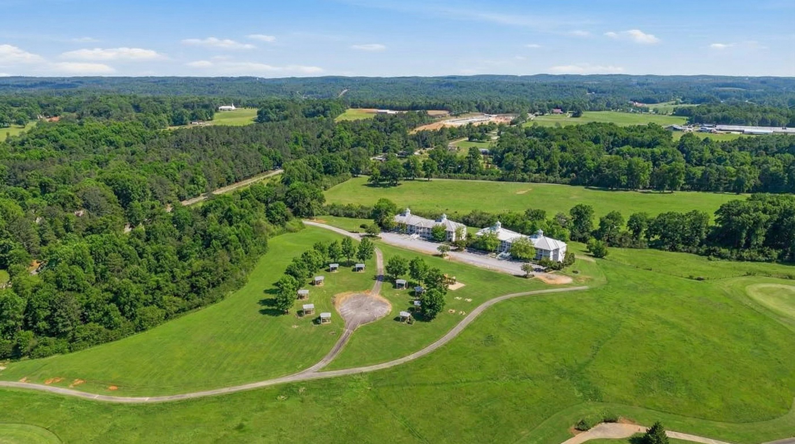 Apple Mountain Resort lodge buildings with gazebo surrounded by forest