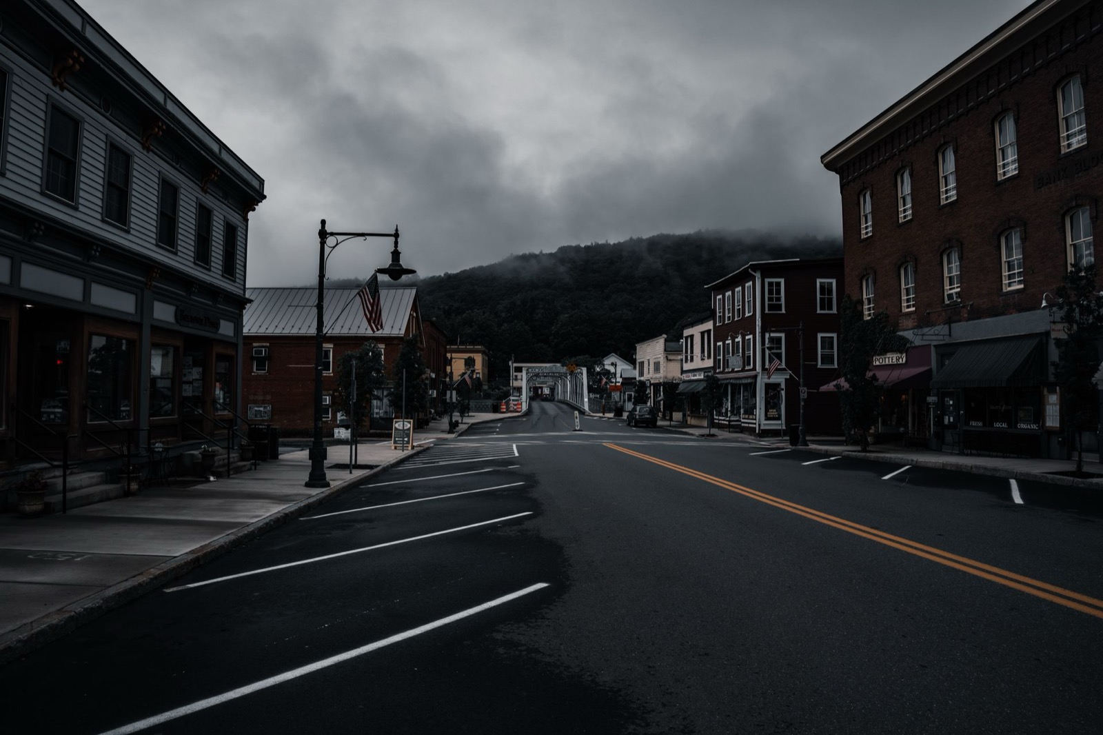 Small town main street with a mountain backdrop, similar to towns in Habersham County, GA