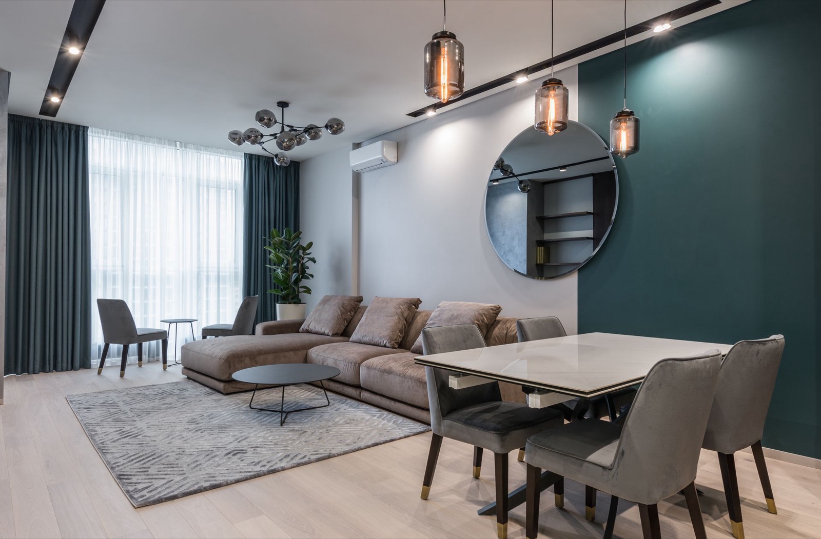Furnished living and dining area, similar to a furnished apartment layout